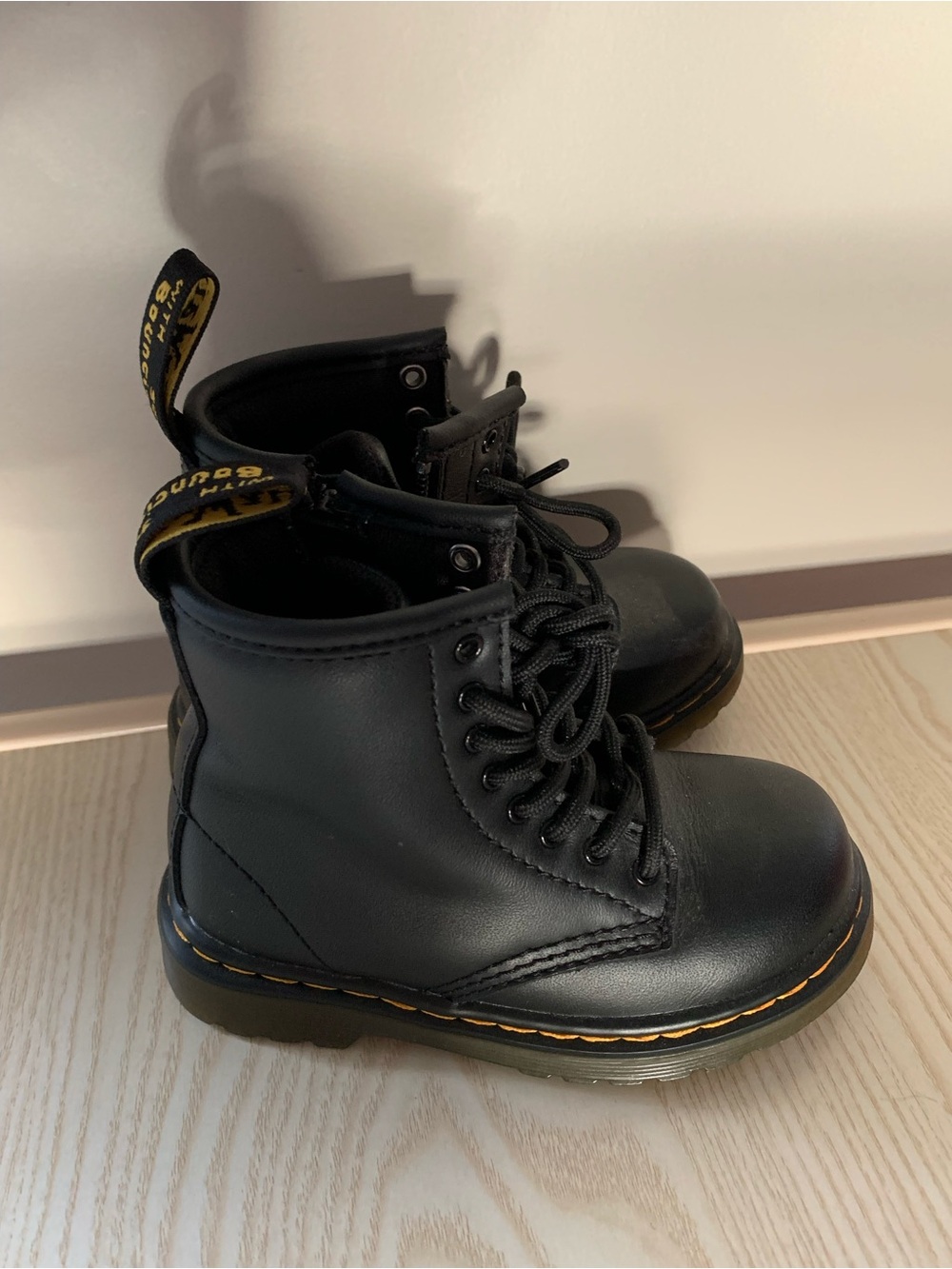 Dr. Martens Kids Black Lace-Up Ankle Boots with Yellow Stitching